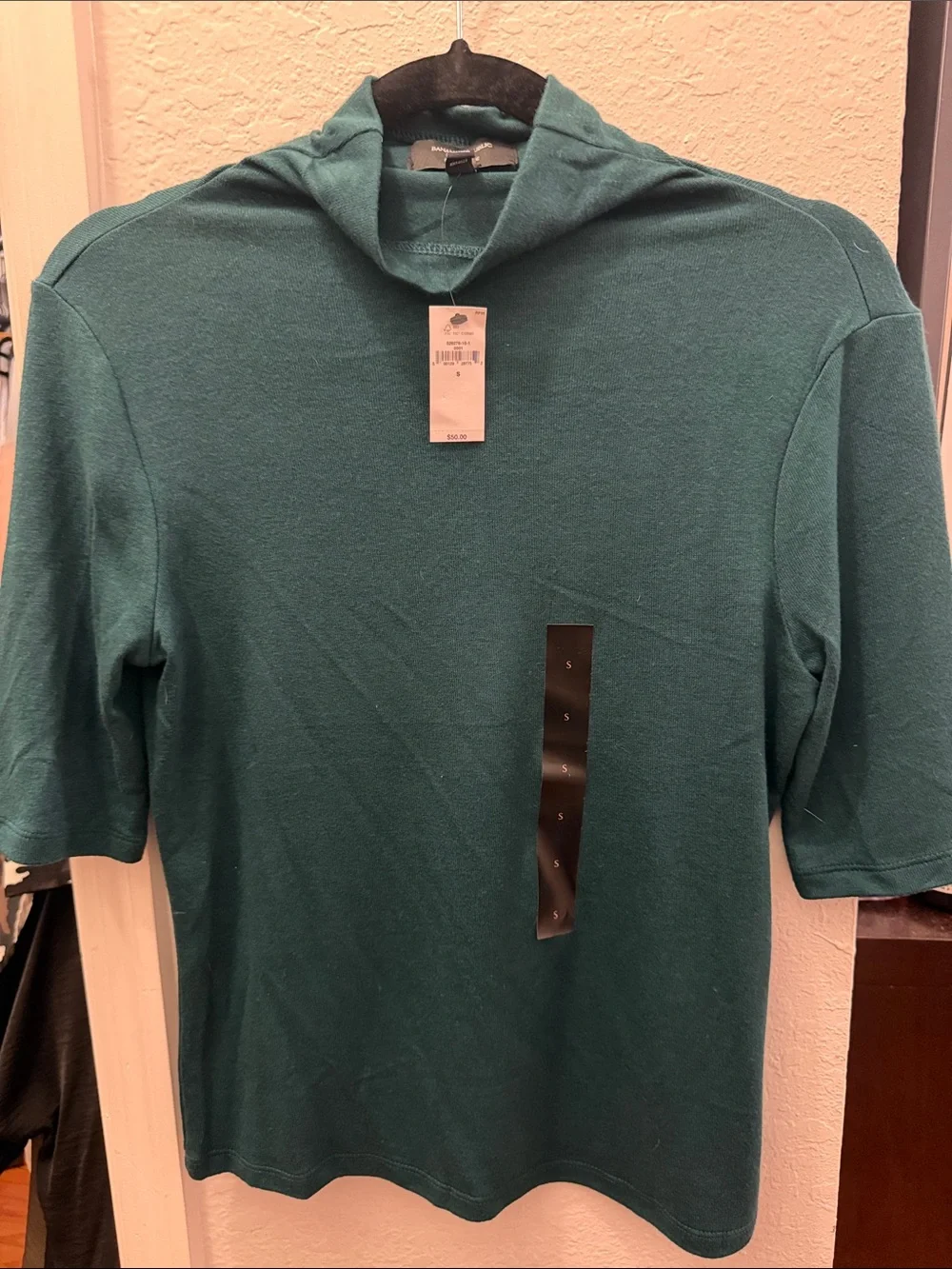 Woman’s Teal Short-Sleeve Hooded Knit Shirt